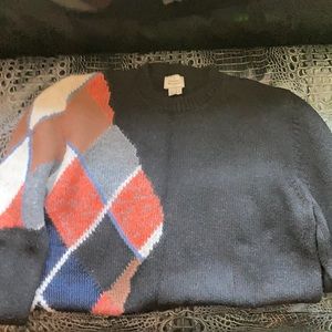 Half argyle sweater
